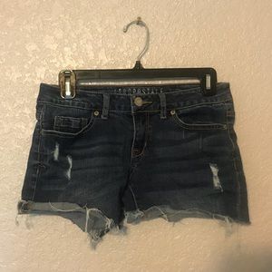 Dark wash distressed shorts